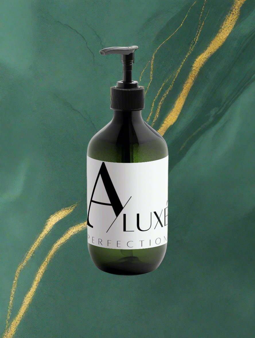 Bottle of Aluxe Perfection on a white background
