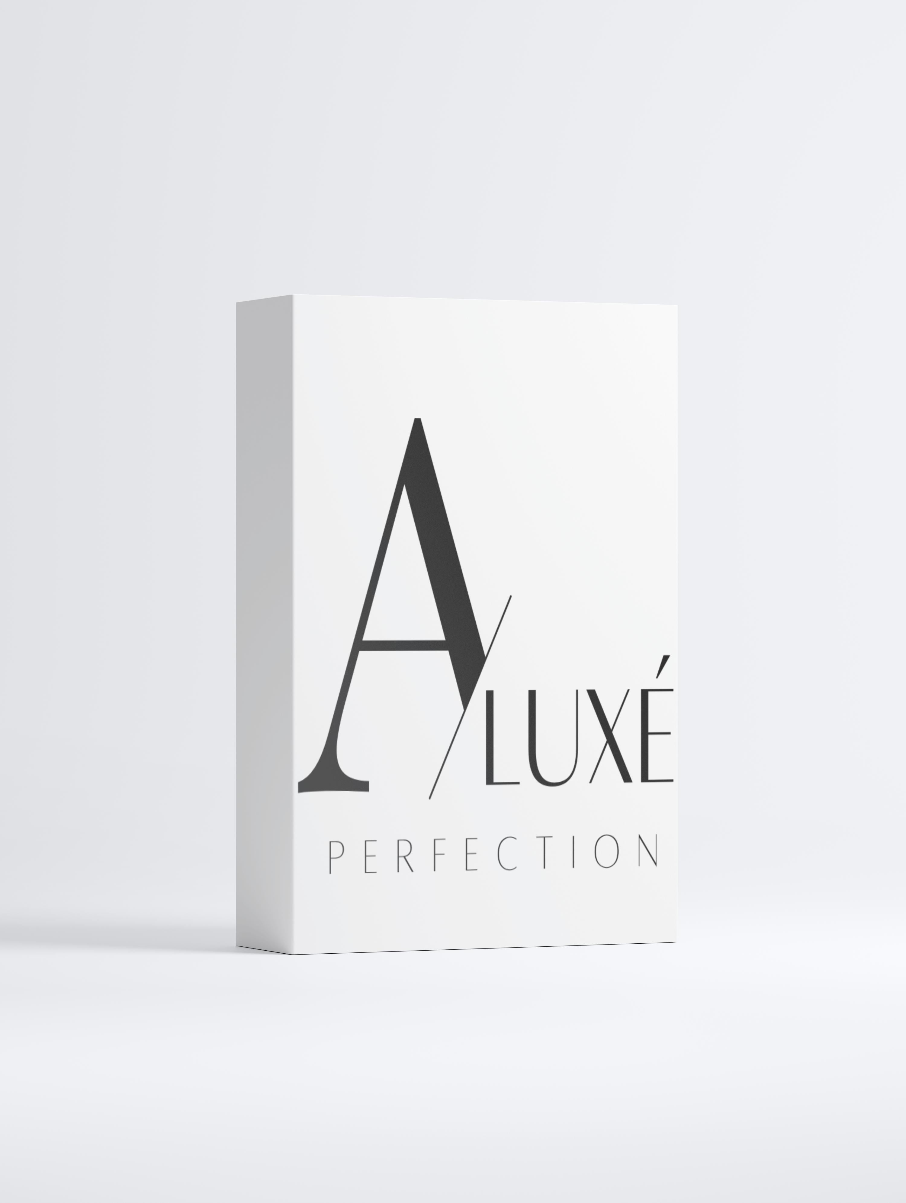 A Luxe Perfection dropper bottle and packaging on a leafy background